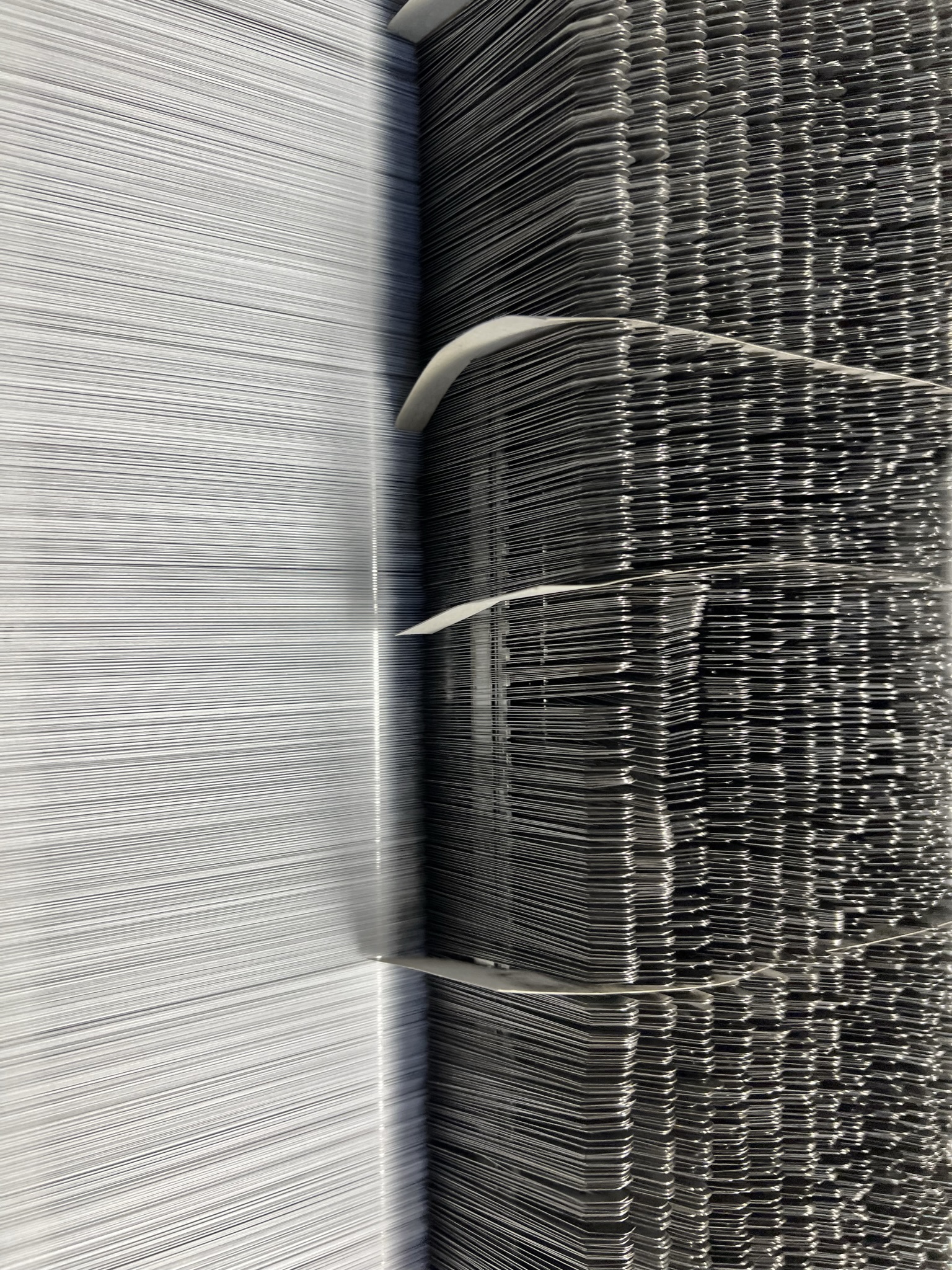Fils et mécanique d’un métier à tisser textile
